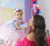 a-person-holding-a-baby.jpg a person holding a baby